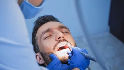 patient receiving the pinhole surgery procedure to help receding gums