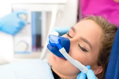 patient sleeping during an oral surgery procedure thanks to sedation dentistry